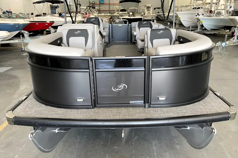 Slide: The Image of 2026 Barletta ARIA 22QC pontoon boat ladder and rear view in a warehouse. - 7