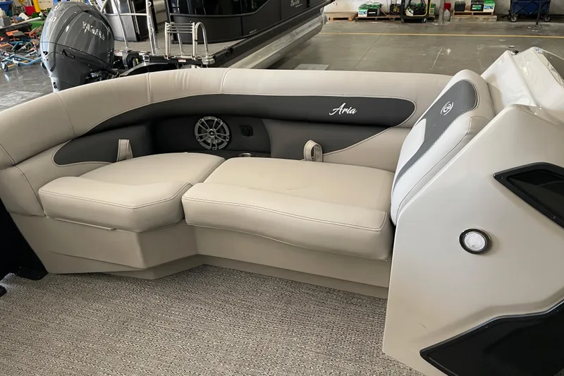 Slide: The Image of 2026 Barletta ARIA 22QC boat interior with plush seating and modern design. - 17