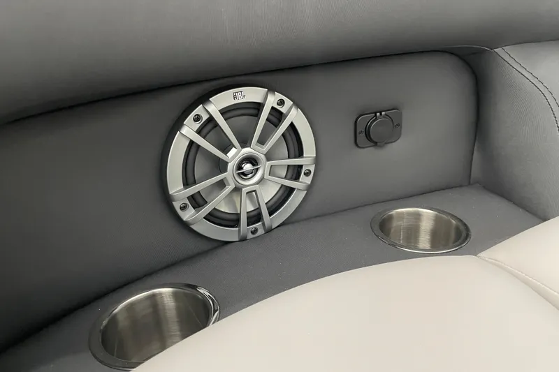 Slide: The Image of Barletta ARIA 22QC 2026 interior with speaker and cup holders. - 19