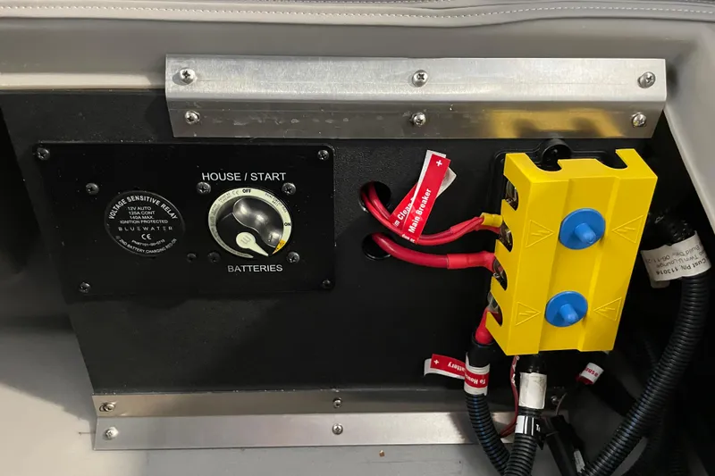 Slide: The Image of Control panel of 2026 Barletta ARIA 22QC boat with battery switches and wiring. - 36