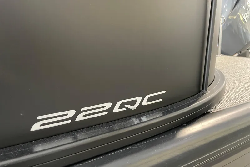 Slide: The Image of 2026 Barletta ARIA 22QC boat model detail with sleek black finish. - 40