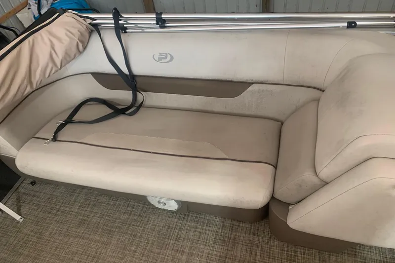 Slide: The Image of 2018 Princecraft Vectra 23 XT boat interior with beige seating and safety straps. - 11