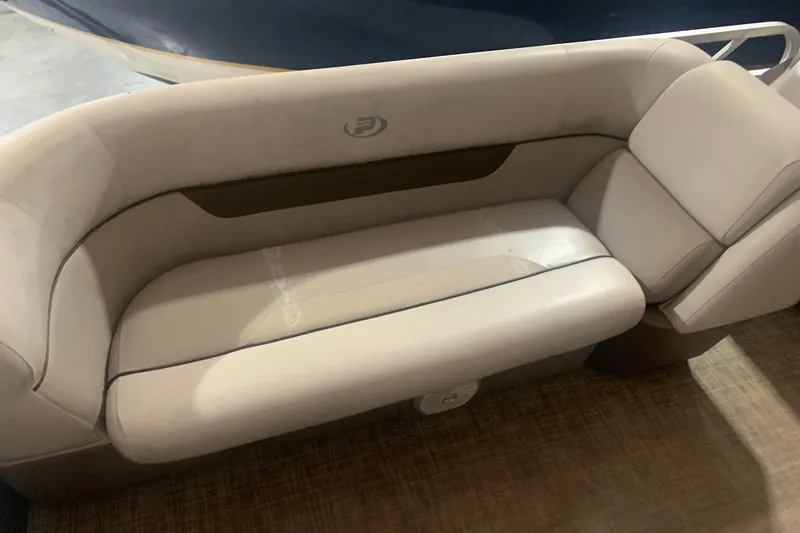 Slide: The Image of 2018 Princecraft Vectra 23 XT boat seating, beige upholstery, comfortable design. - 12