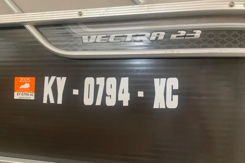 Slide: The Image of 2018 Princecraft Vectra 23 XT boat with registration KY-0794-XC and 2025 sticker. - 15