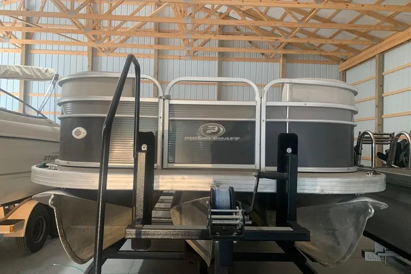 Slide: The Image of 2018 Princecraft Vectra 23 XT pontoon boat in a storage facility. - 3