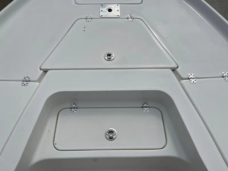 Slide: The Image of 2025 Key West 230 Bay Reef boat deck with storage compartments. - 8