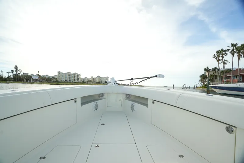 Slide: The Image of 2013 SeaVee 390B boat interior with coastal view and clear sky. - 16