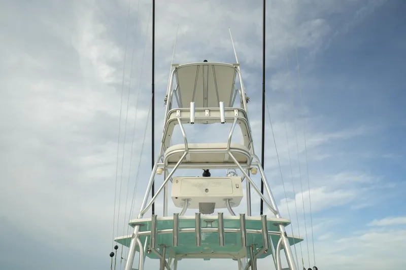 Slide: The Image of SeaVee 390B 2013 boat tower against a cloudy sky. - 26