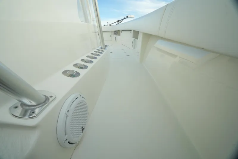 Slide: The Image of 2013 SeaVee 390B boat deck with speakers and rod holders. - 30