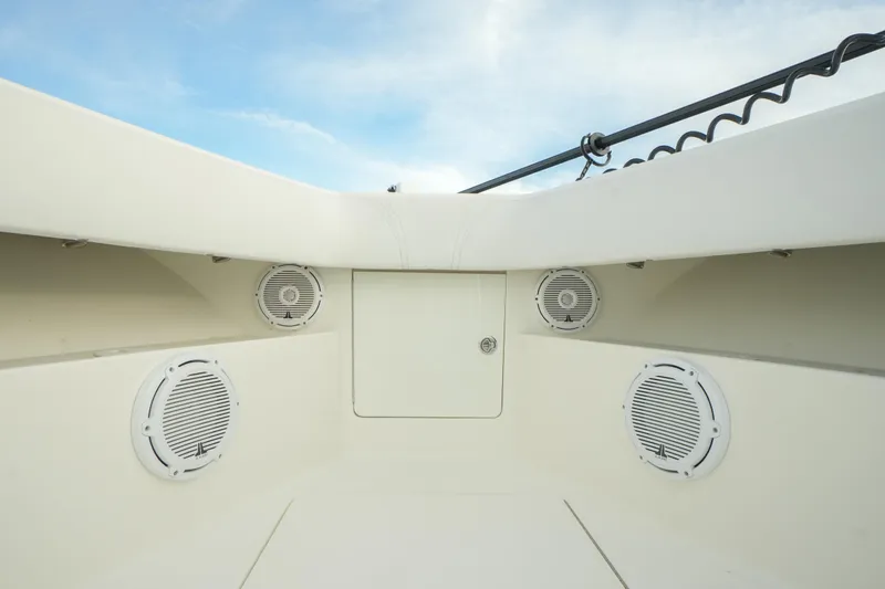 Slide: The Image of 2013 SeaVee 390B boat interior with speakers and storage compartment. - 31