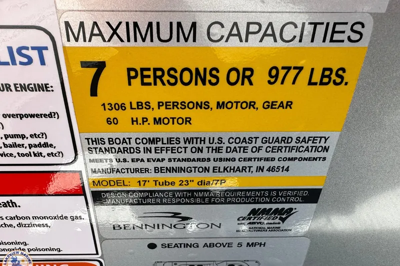 Slide: The Image of 2025 Bennington 18 SXL boat capacity label: 7 persons, 977 lbs, 60 HP motor. - 11