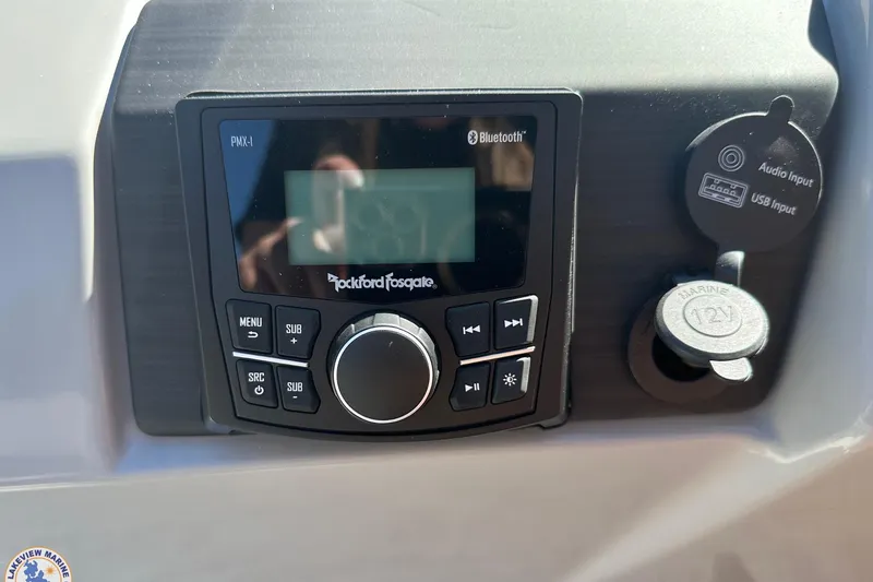 Slide: The Image of 2025 Bennington 18 SXL boat audio system with Bluetooth and USB input. - 6