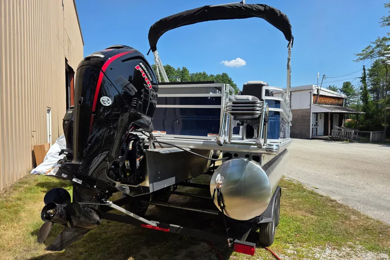 Slide: The Image of 2026 Sun Tracker SportFish 20 DLX pontoon boat with powerful outboard motor. - 3