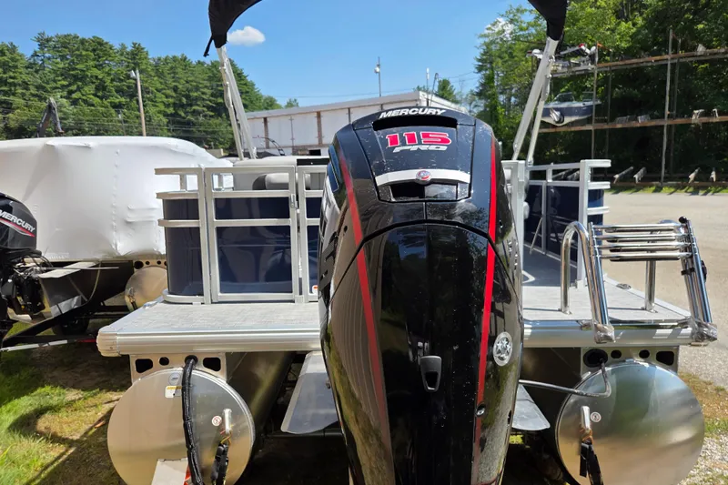 Slide: The Image of 2026 Sun Tracker SportFish 20 DLX pontoon boat with Mercury 115 outboard motor. - 4