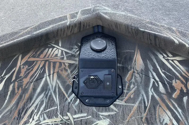 Slide: The Image of 2020 SeaArk RX 170 boat with camo pattern and control panel detail. - 17