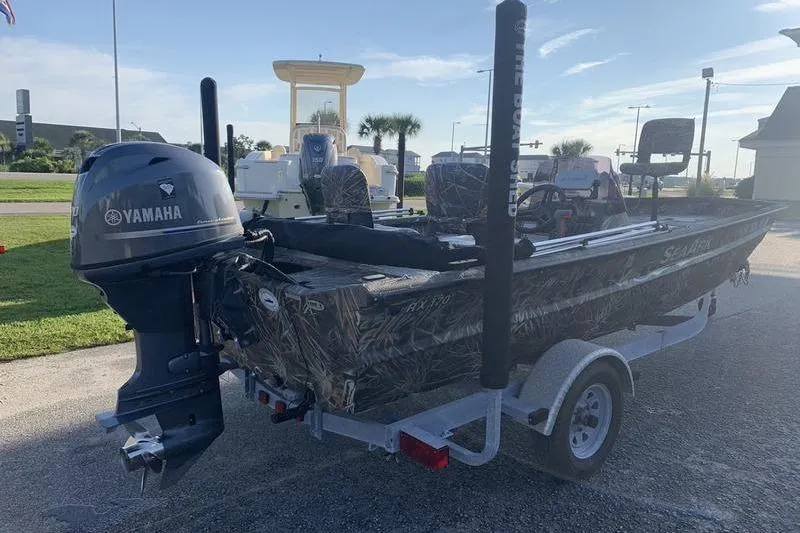 Slide: The Image of 2020 SeaArk RX 170 boat with Yamaha outboard motor on a trailer. - 3