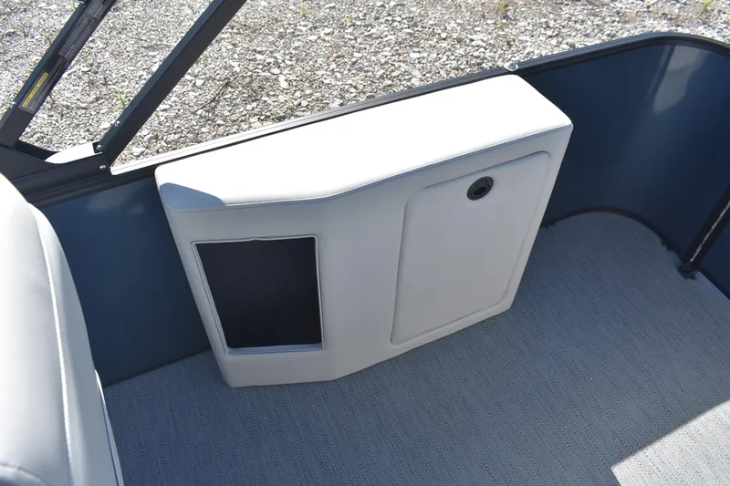 Slide: The Image of 2026 Godfrey Sweetwater 2086 C boat interior with storage compartment and carpeted floor. - 19