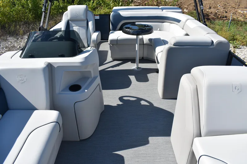 Slide: The Image of Luxurious interior of 2026 Godfrey Sweetwater 2086 C pontoon boat with plush seating. - 2
