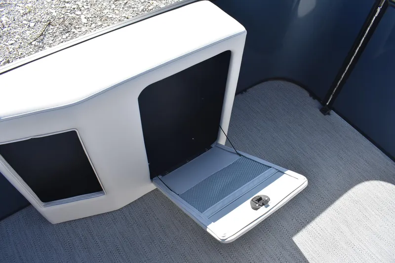 Slide: The Image of 2026 Godfrey Sweetwater 2086 C boat storage compartment with open hatch on deck. - 21