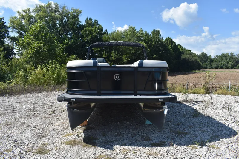 Slide: The Image of 2026 Godfrey Sweetwater 2086 C pontoon boat on gravel, surrounded by trees. - 4