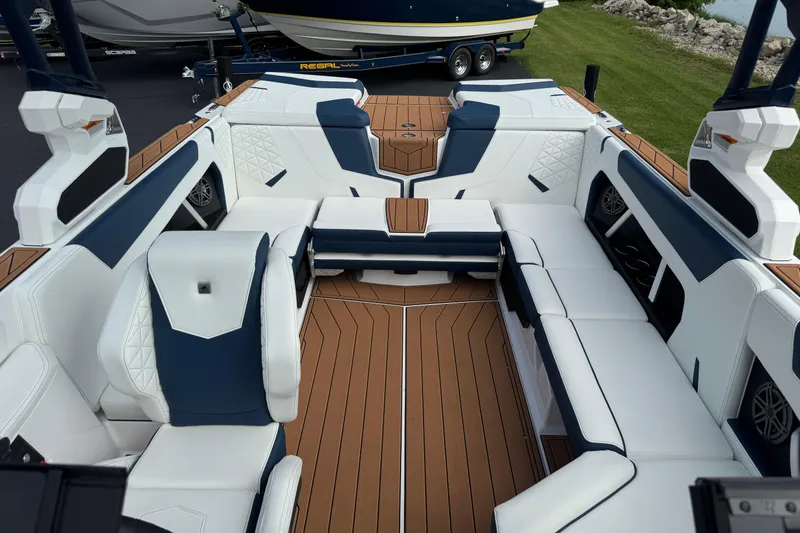 Slide: The Image of 2026 Nautique Super Air Nautique GS22 interior with luxurious seating and modern design. - 12