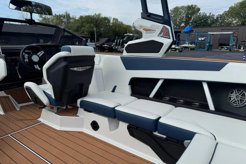 Slide: The Image of 2026 Nautique Super Air Nautique GS22 interior with modern seating and sleek design. - 18