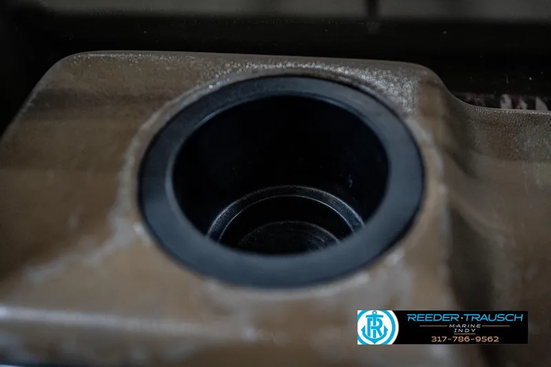 Slide: The Image of Close-up of a 2007 G3 1860 CCT boat cup holder with Reeder-Trausch Marine logo. - 35
