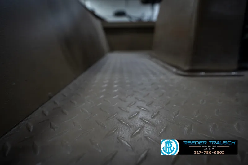 Slide: The Image of Textured metal floor of a 2007 G3 1860 CCT boat interior. - 40