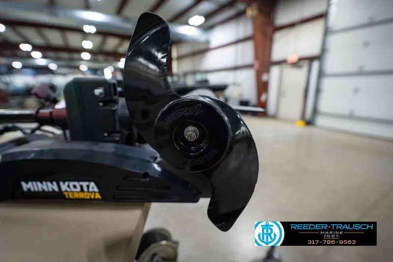Slide: The Image of Minn Kota Terrova motor propeller on 2007 G3 1860 CCT boat in a garage. - 48