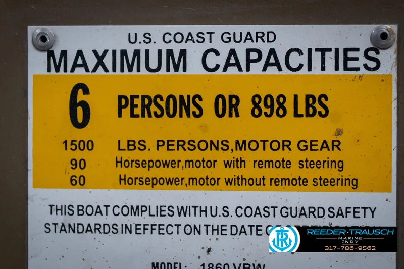 Slide: The Image of U.S. Coast Guard capacity label for 2007 G3 1860 CCT boat, 6 persons or 898 lbs. - 53