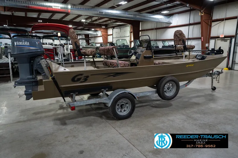 Slide: The Image of 2007 G3 1860 CCT boat with Yamaha motor on trailer in showroom. - 7
