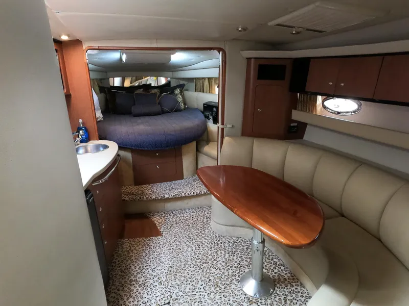 Slide: The Image of Interior of 2004 Chaparral Signature 350 yacht with cozy seating and modern amenities. - 17