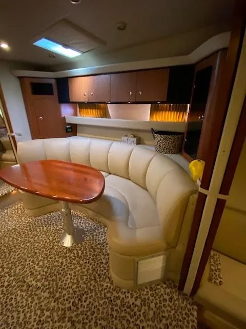 Slide: The Image of Luxurious interior of 2004 Chaparral Signature 350 yacht with plush seating and elegant wood finishes. - 20