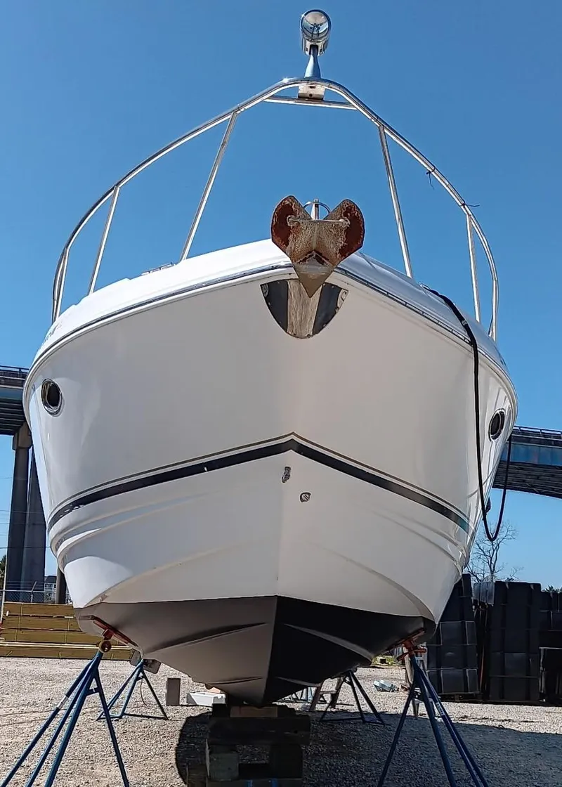 Slide: The Image of 2004 Chaparral Signature 350 boat on stands, viewed from the front. - 29