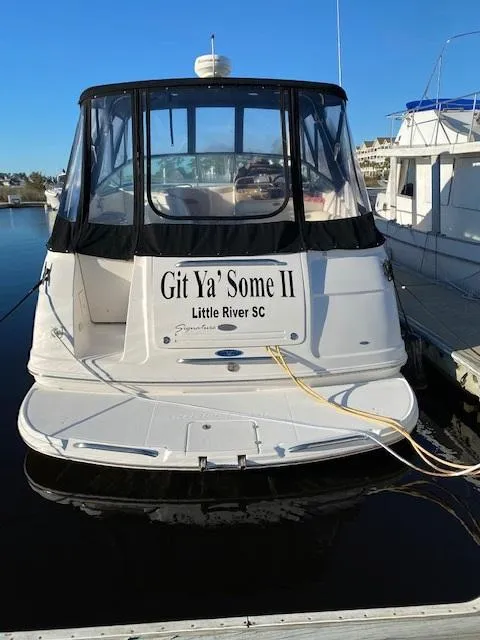 Slide: The Image of 2004 Chaparral Signature 350 boat docked, named "Git Ya' Some II," Little River, SC. - 4