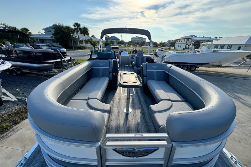 Slide: The Image of 2026 Bennington 24 MFB pontoon boat with spacious seating and modern design. - 10