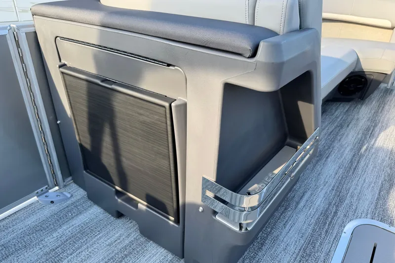 Slide: The Image of Interior of 2026 Bennington 24 MFB boat, featuring sleek seating and modern design elements. - 14