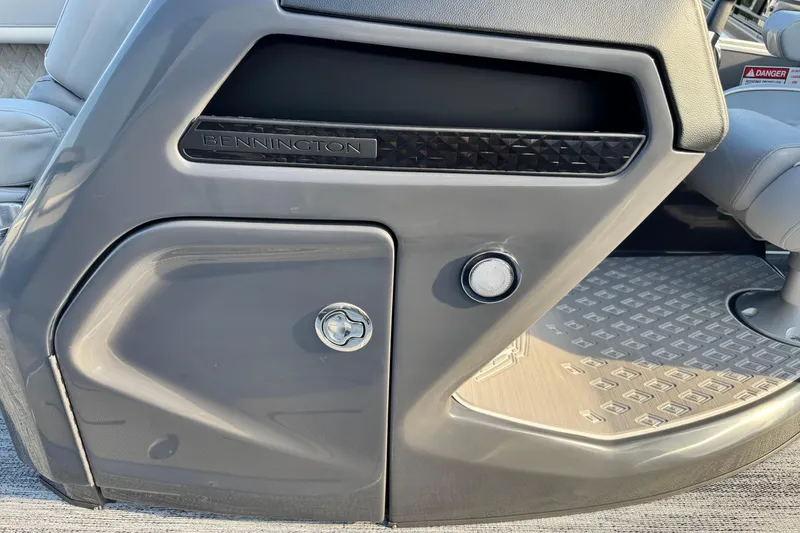 Slide: The Image of 2026 Bennington 24 MFB boat console with sleek design and modern features. - 15