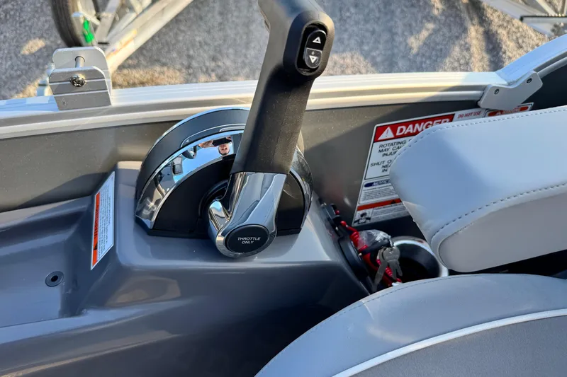Slide: The Image of Throttle control of 2026 Bennington 24 MFB boat with safety warnings visible. - 20