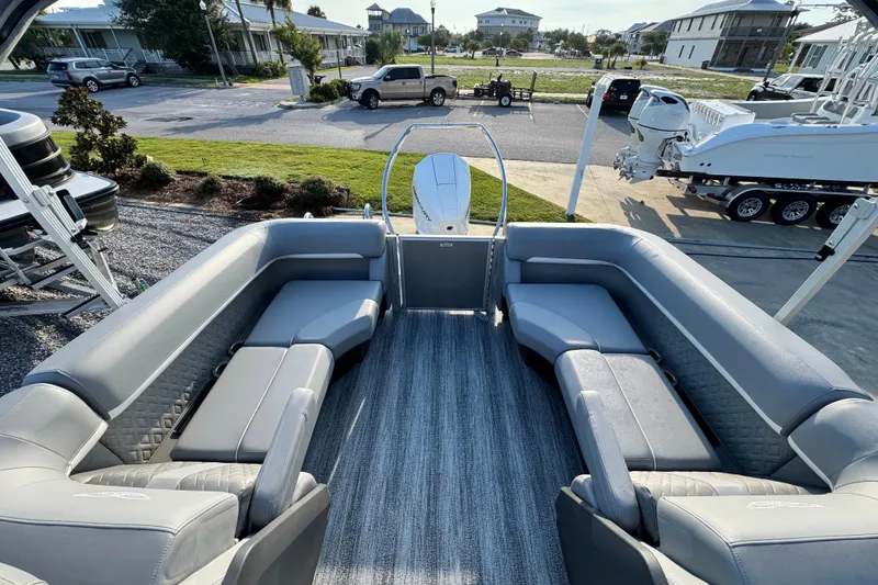 Slide: The Image of 2026 Bennington 24 MFB pontoon boat with spacious gray seating and modern design. - 23
