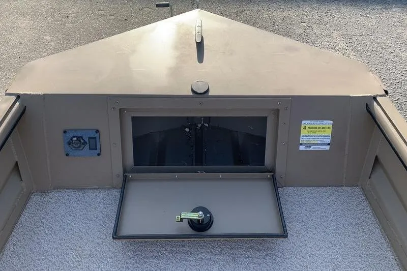 Slide: The Image of 2025 SeaArk DXS 1548 DKLD boat interior with storage compartment open. - 13