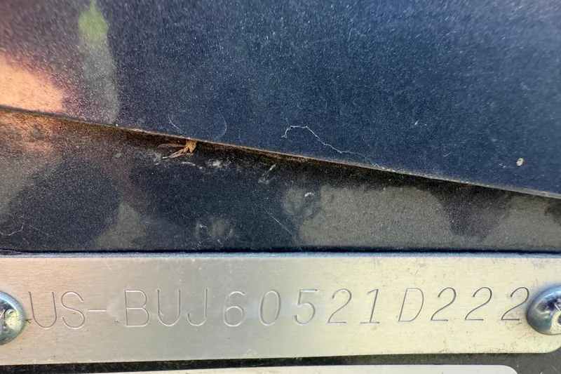 Slide: The Image of Close-up of a 2022 Tracker PGV16SC serial number plate. - 10
