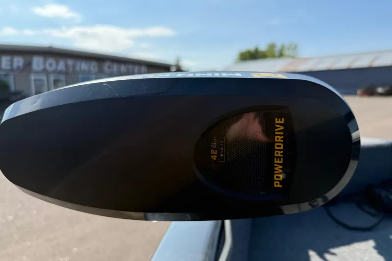 Slide: The Image of Close-up of a 2022 Tracker PGV16SC PowerDrive motor at a boating center. - 9