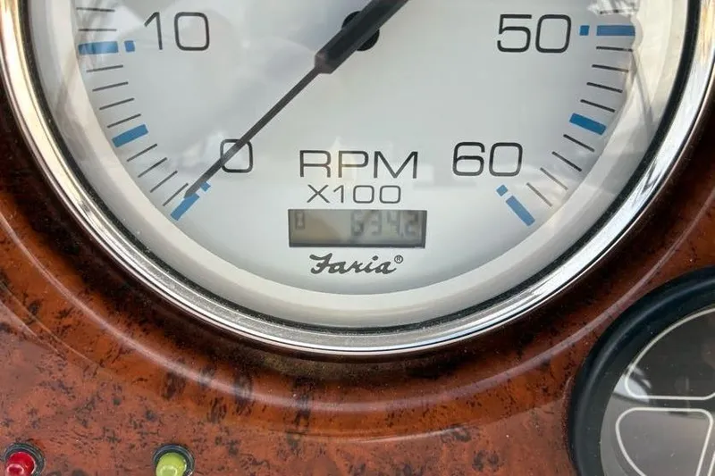 Slide: The Image of Close-up of a Faria RPM gauge on a 2005 Silverton 34 Convertible boat. - 29