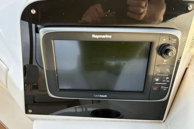 Slide: The Image of Raymarine HybridTouch display on 2005 Silverton 34 Convertible boat dashboard. - 9