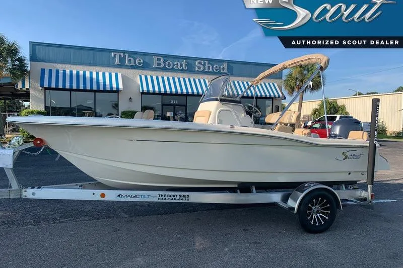 The Image of 2026 Scout 195 Sportfish boat on trailer at The Boat Shed dealership. - 0