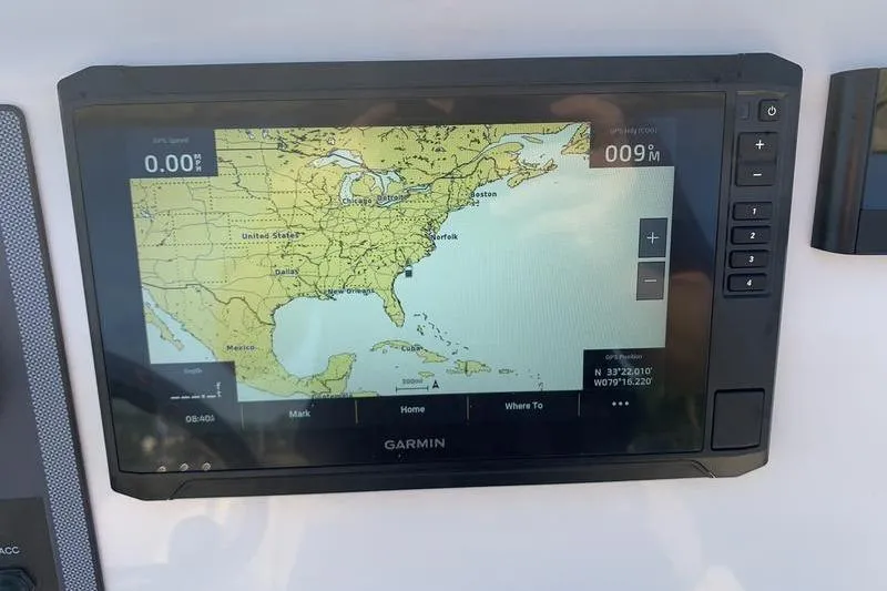 Slide: The Image of Garmin GPS display on 2026 Scout 195 Sportfish boat, showing U.S. East Coast map. - 16