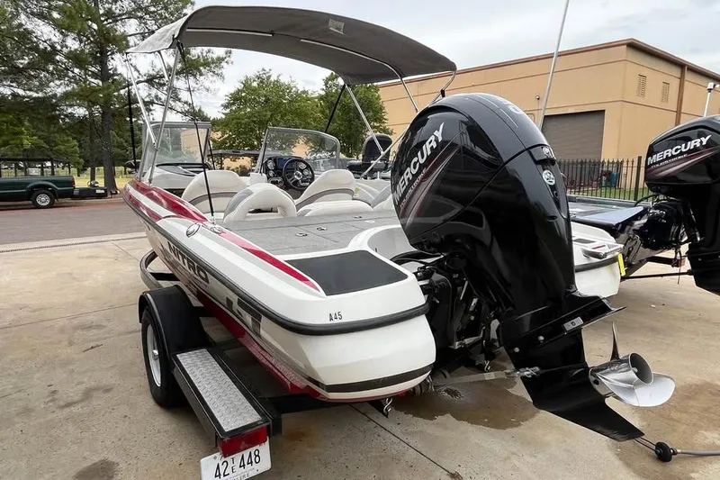Slide: The Image of 2016 Tracker Nitro Z7 Sport boat with Mercury engine on trailer. - 11