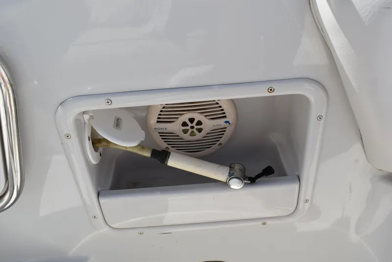 Slide: The Image of 2005 Crownline 275 CCR boat shower compartment with speaker. - 11