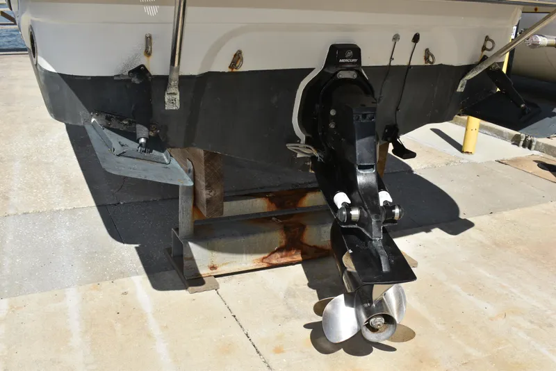 Slide: The Image of Rear view of 2005 Crownline 275 CCR boat with outboard motor. - 47